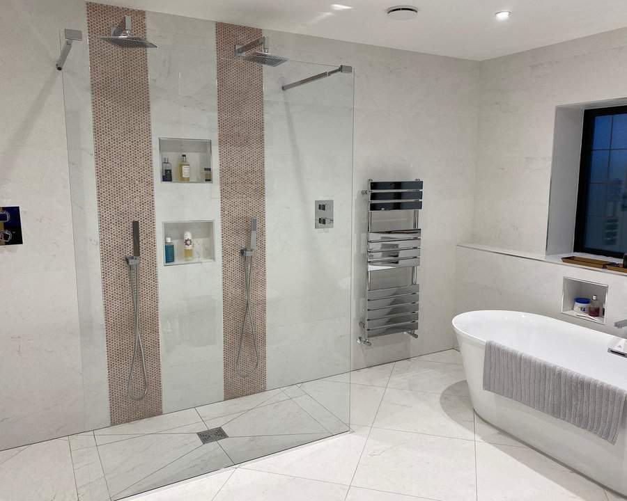 bathroom shower with mosaic tiles