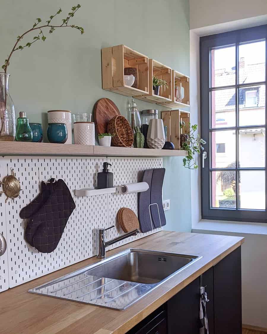 Kitchen with wooden accents and steel undermount sink