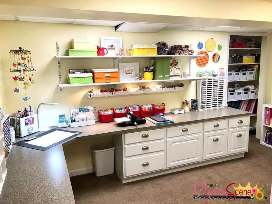 Bright craft room with cabinets and shelves