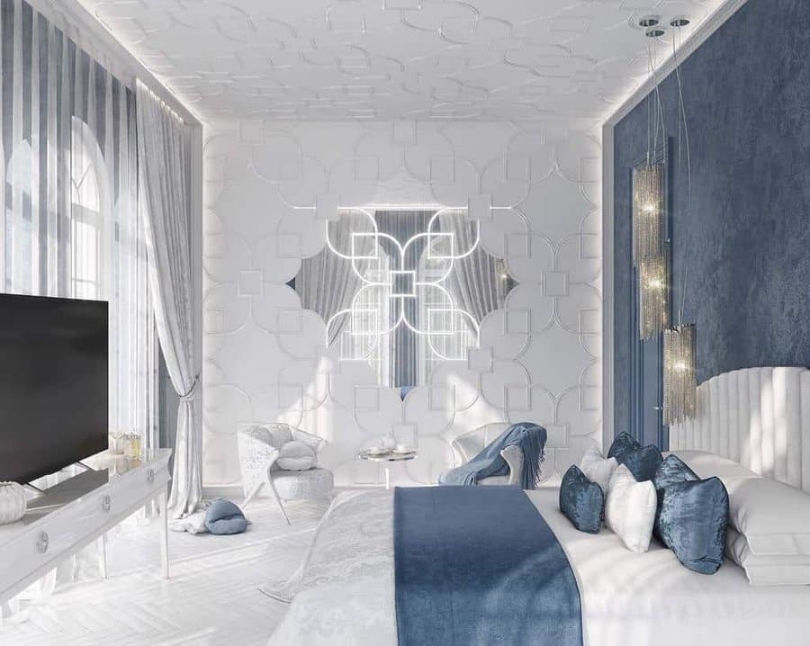 Blue bedroom with mirrors