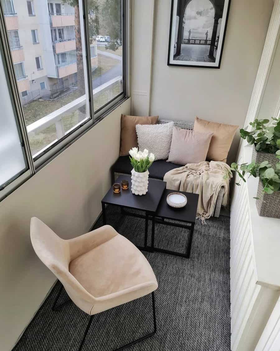 apartment balcony with cozy seating area