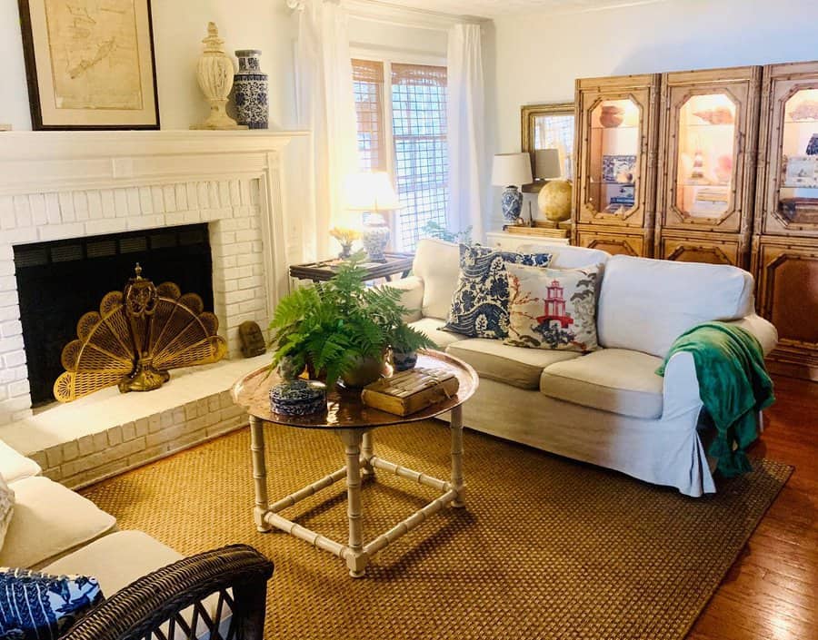 Cozy living room with fireplace and mirrored cabinet