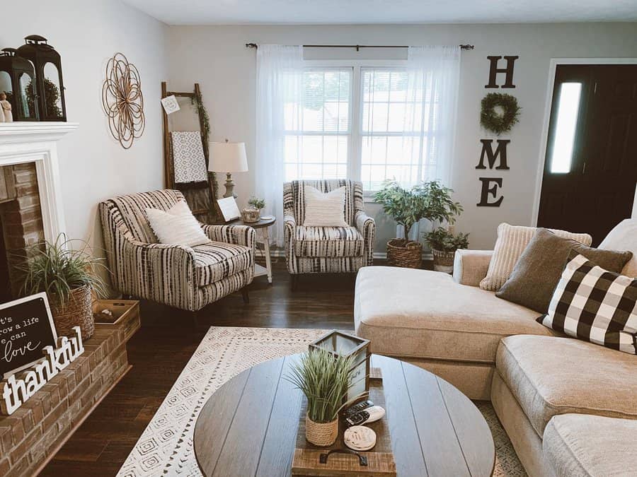 Welcoming living room with striped chairs and sectional