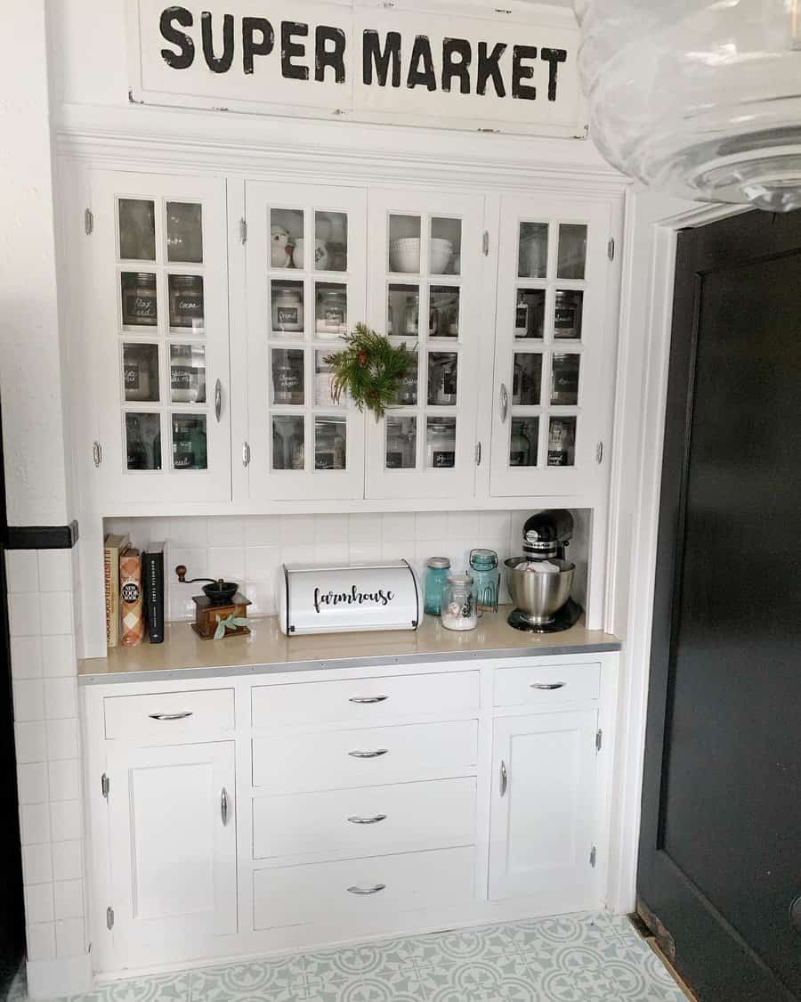 White kitchen cabinet with glass doors