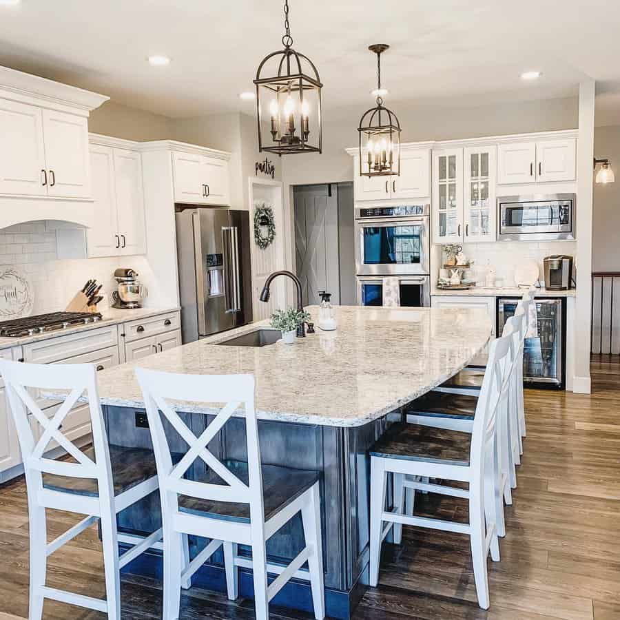 Contemporary kitchen with wooden accents and pendant lights