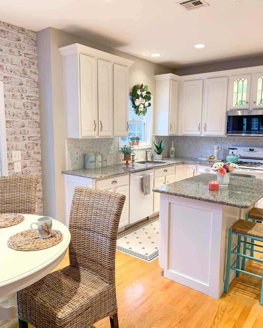 White cabinets with marble countertops