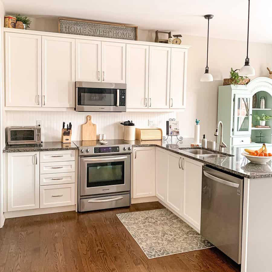 White cabinets with marble countertops