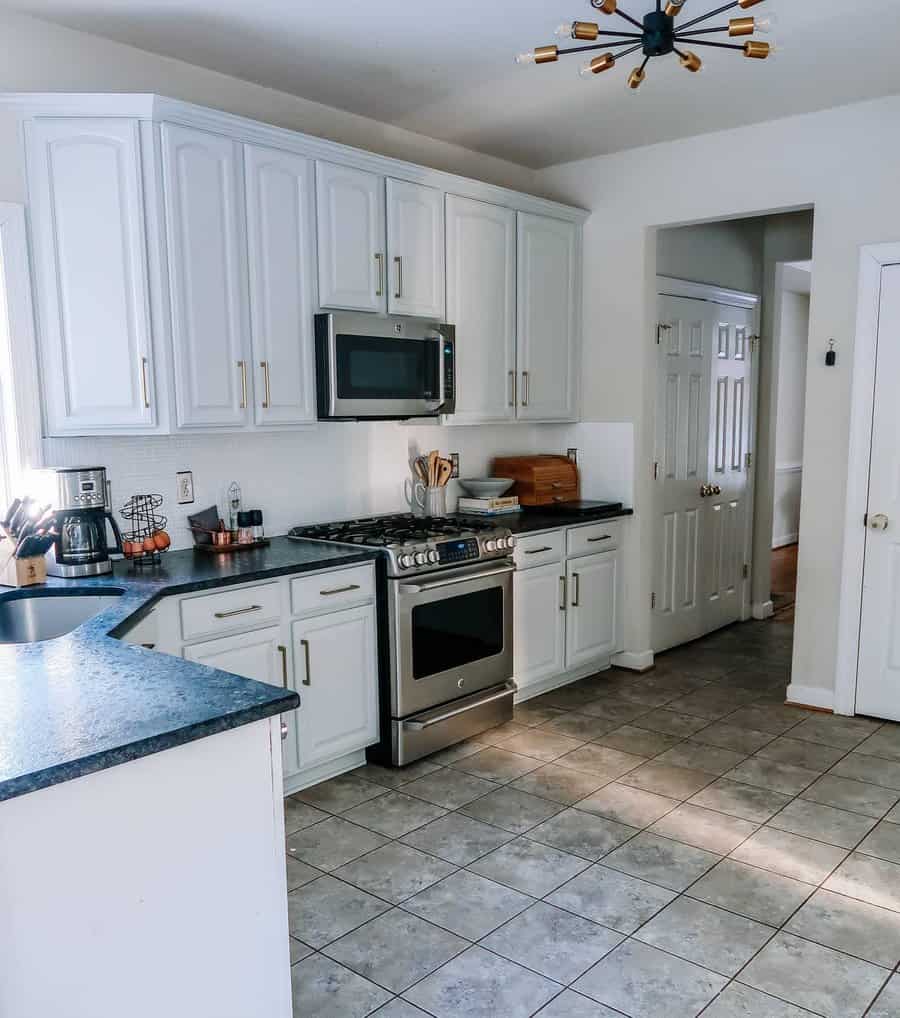 White cabinets with marble countertops