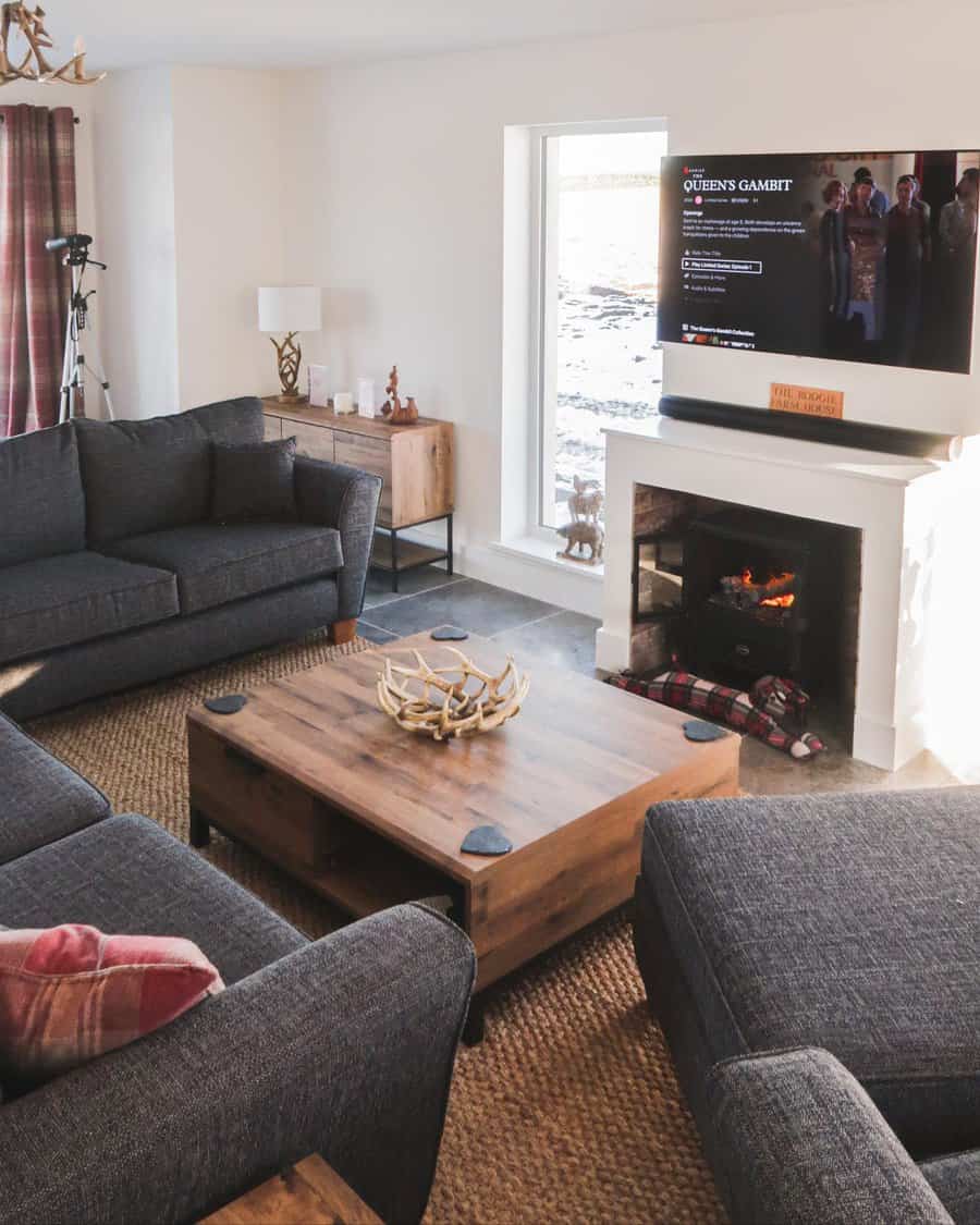 Cozy living room with fireplace and wooden coffee table