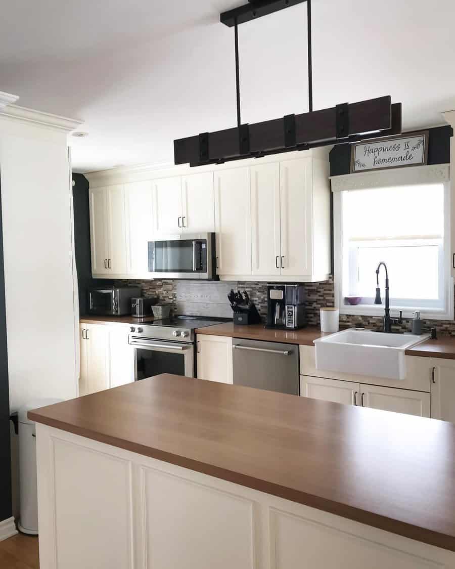 small galley kitchen with black fixtures