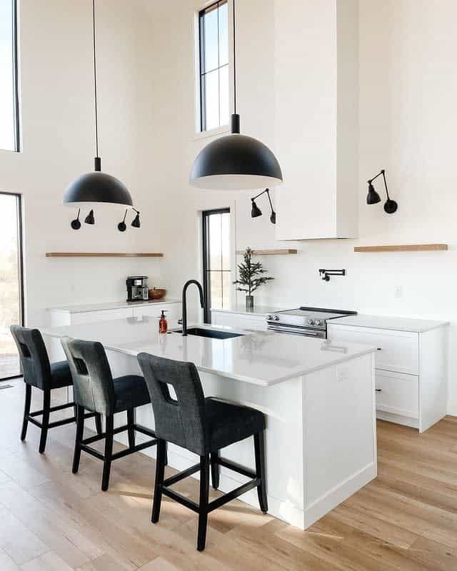white kitchen with black fixtures 