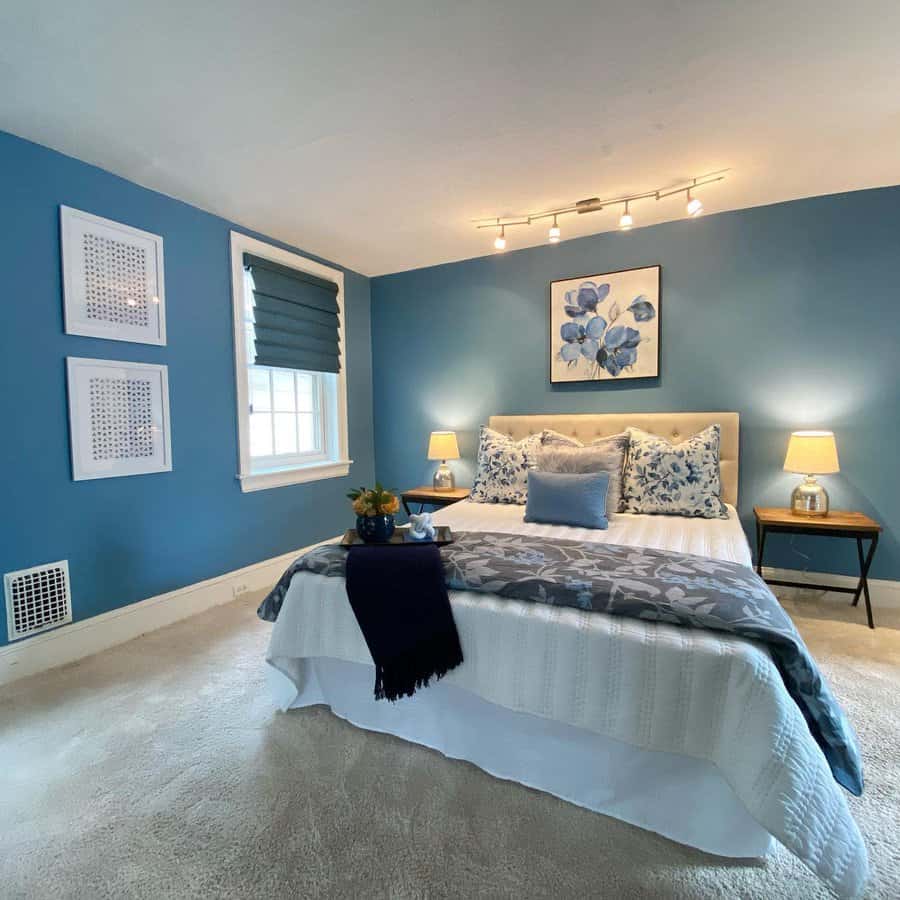 blue bedroom with drop lights 