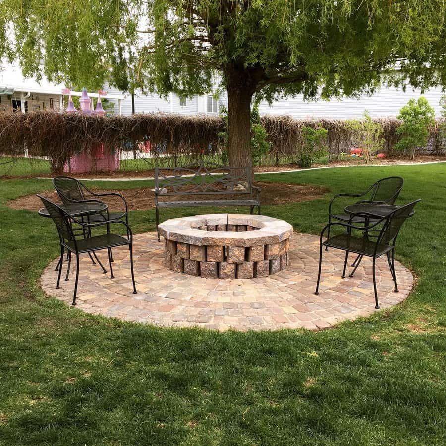 Patio with brick fireplace