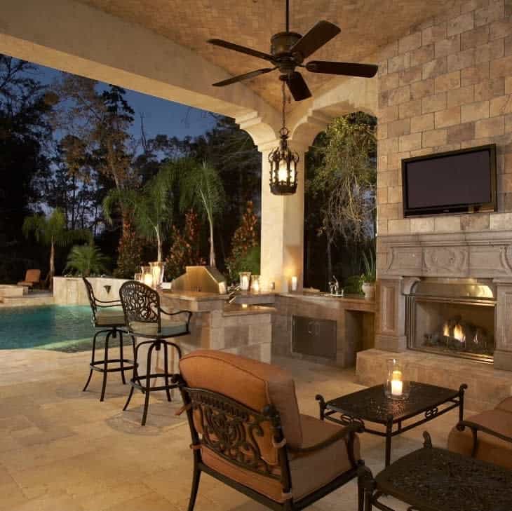 Patio with fireplace and pool