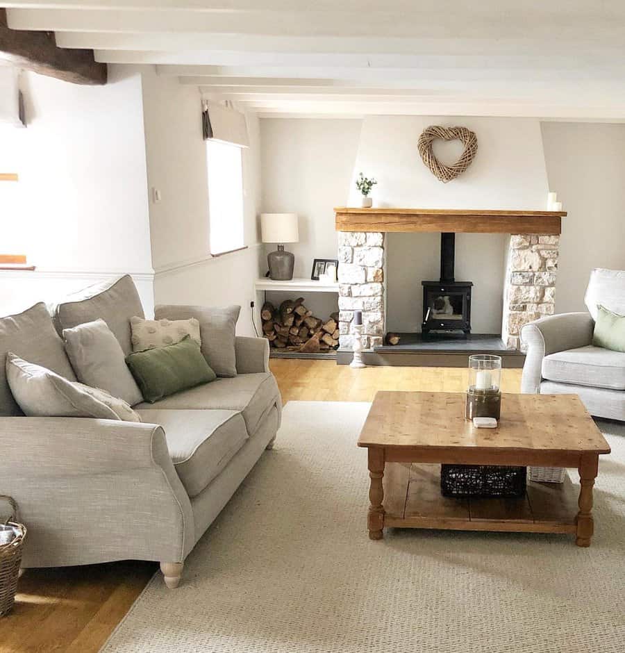 Charming living room with fireplace and wooden heart decor