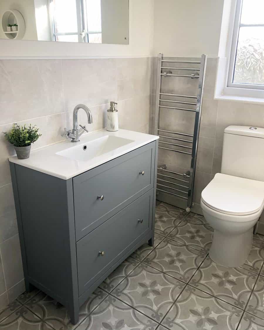 Vintage gray bathroom with patterned floor