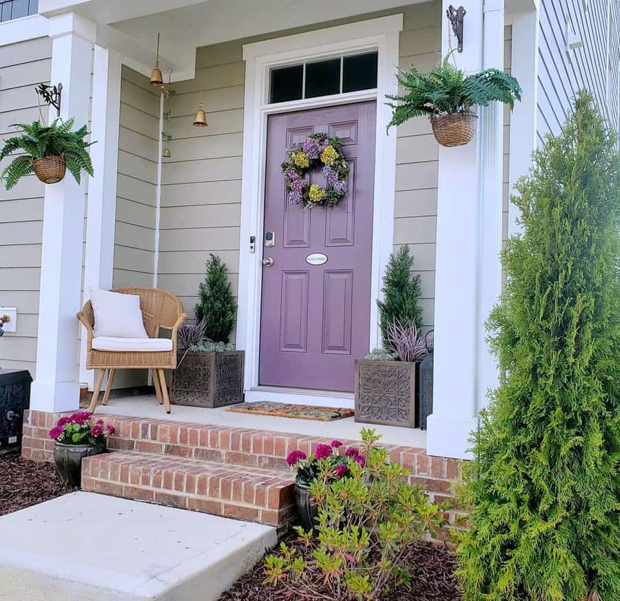 front porch door with decor