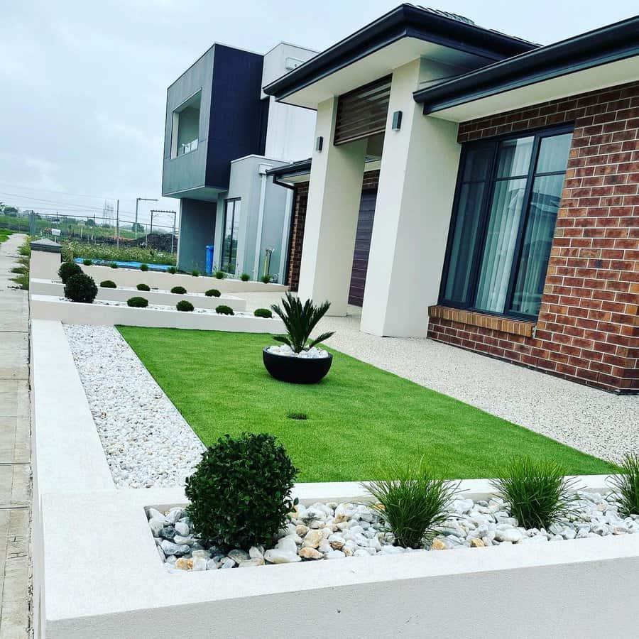 Pebbles around artificial grass