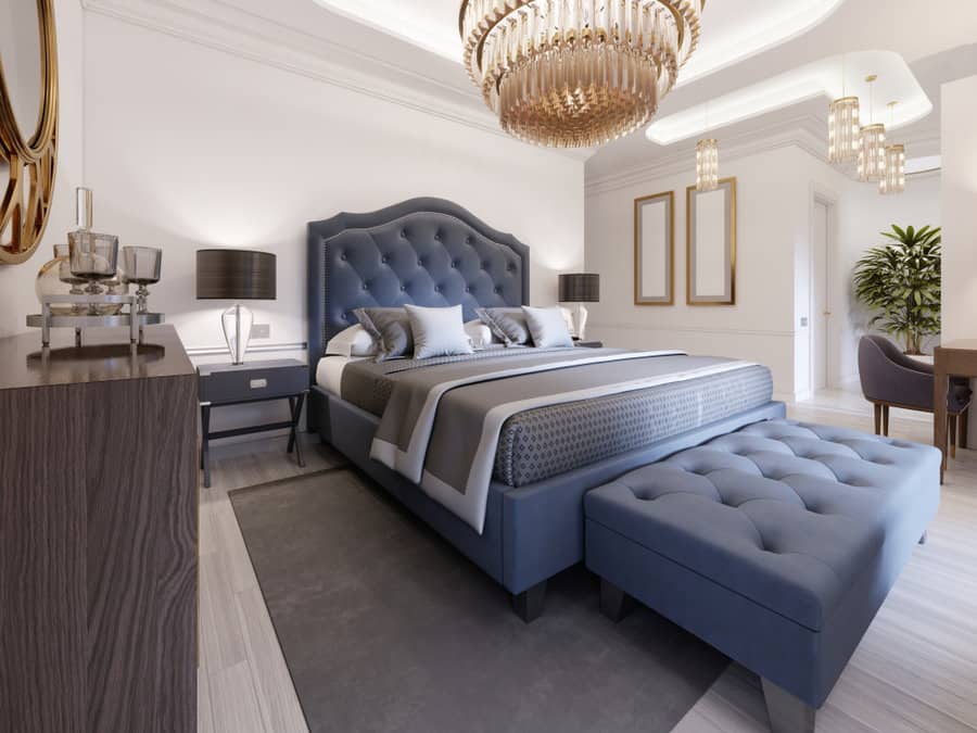 blue bedroom with blue and gold elements