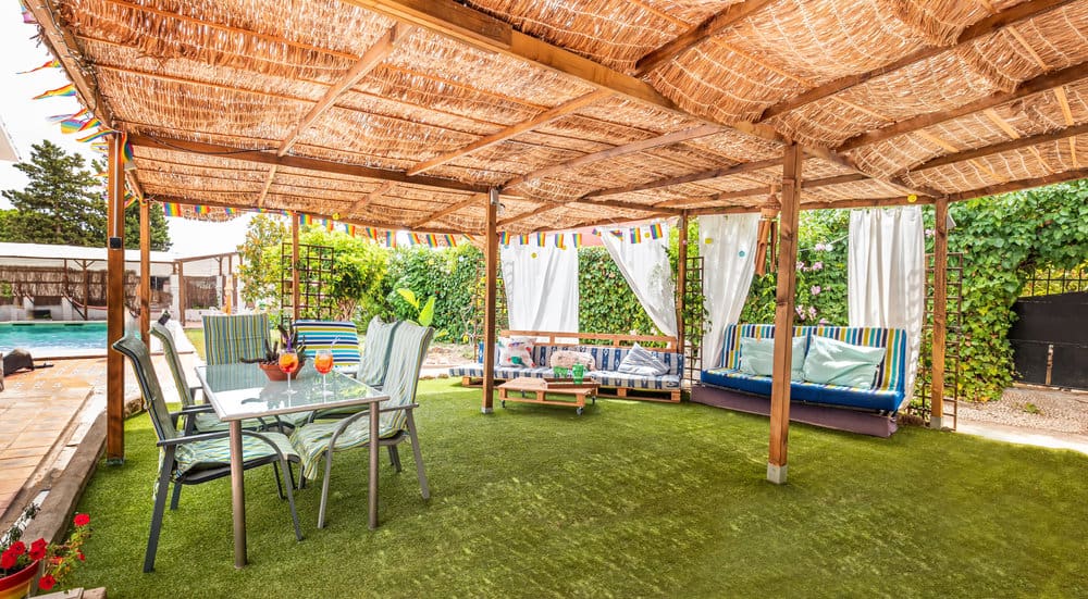 Bamboo covered poolside gazebo