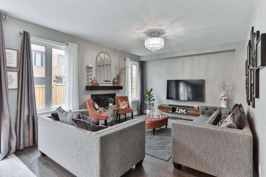 Cozy living room with chic decor and crystal chandelier