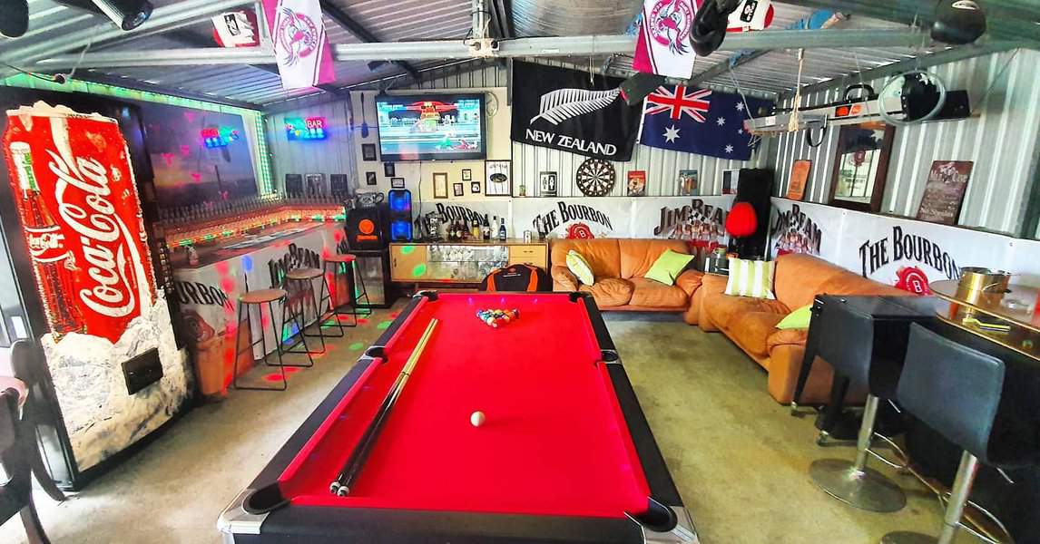 garage man cave with pool table