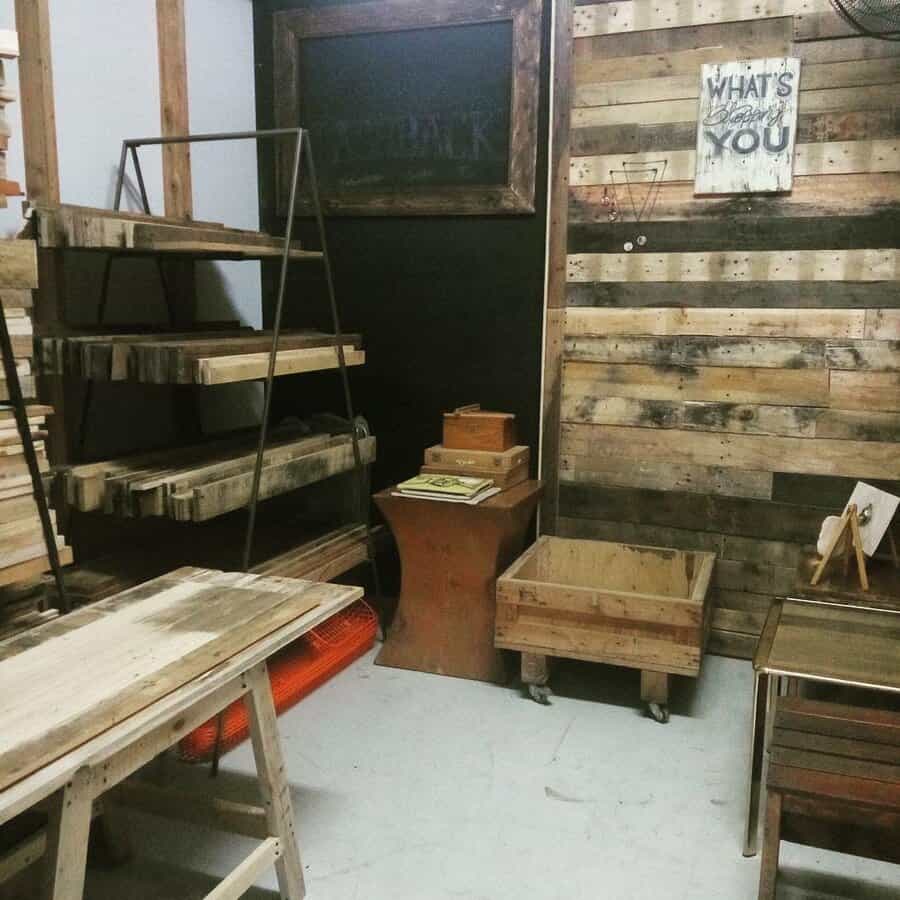 Rustic garage with pallet wood wall and DIY furniture