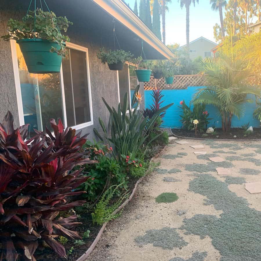 Backyard landscape with hanging plants