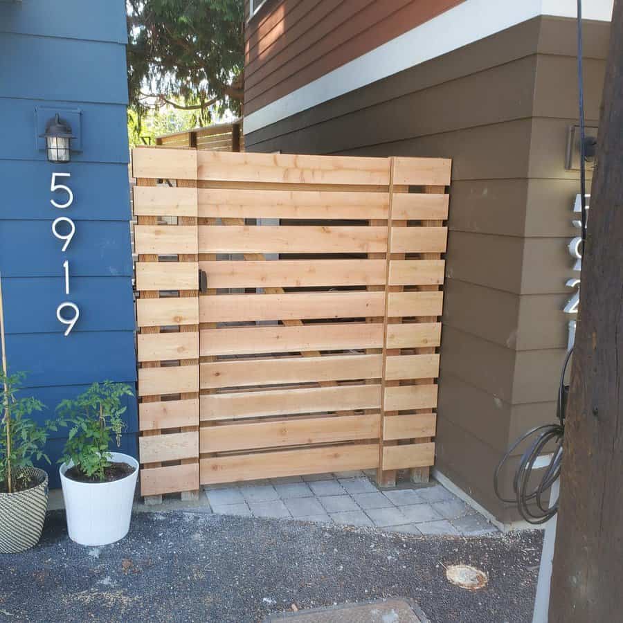 A pallet gate in front of a house