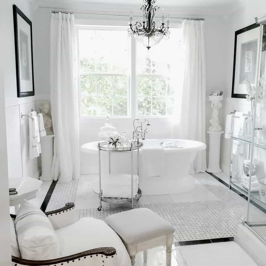 Master Bathroom With White Bathtub And Furnitures