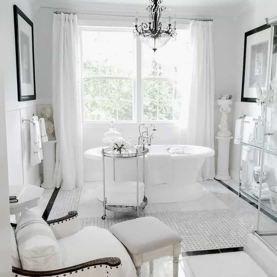 All white elegant bathroom with chandelier