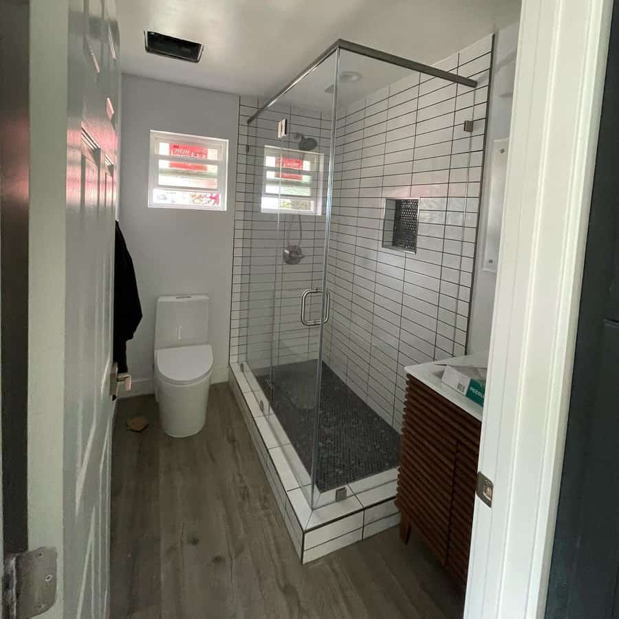 bathroom shower with frameless glass door