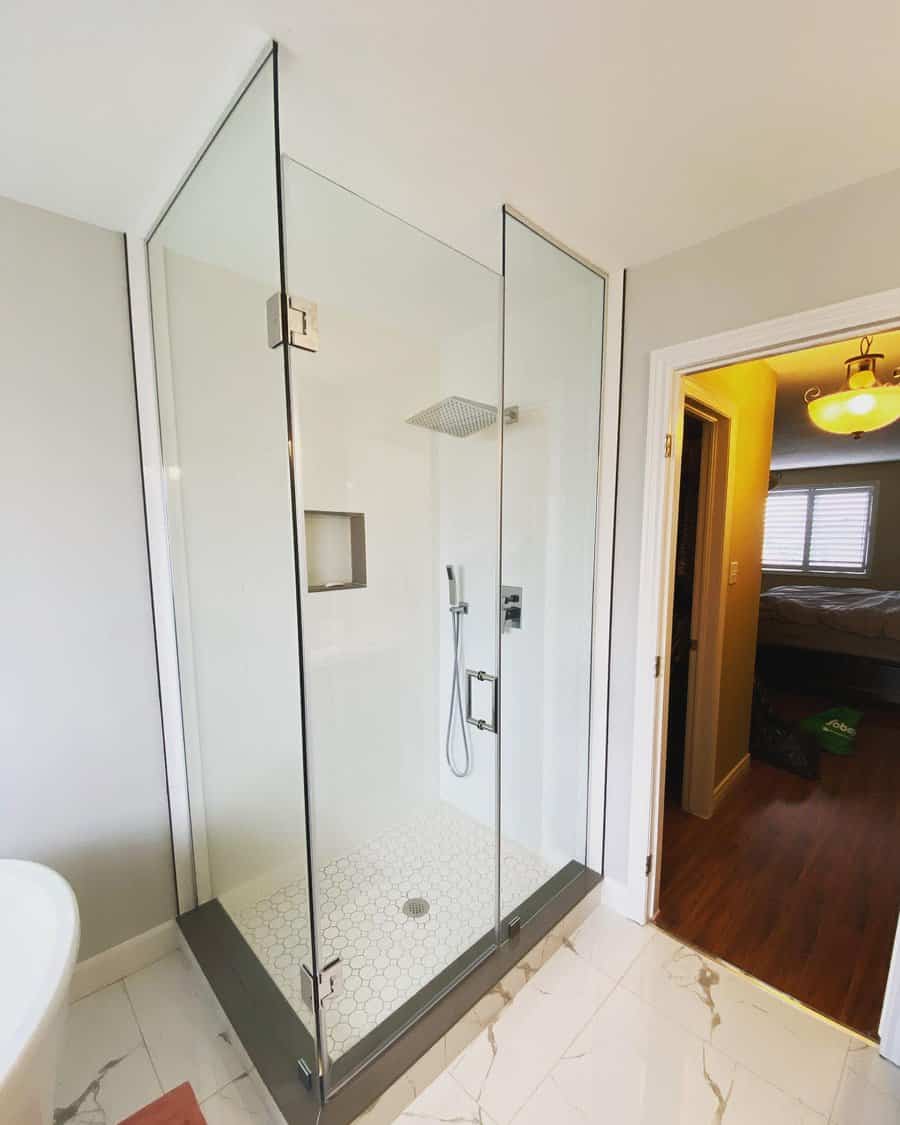 bathroom shower with frameless glass door