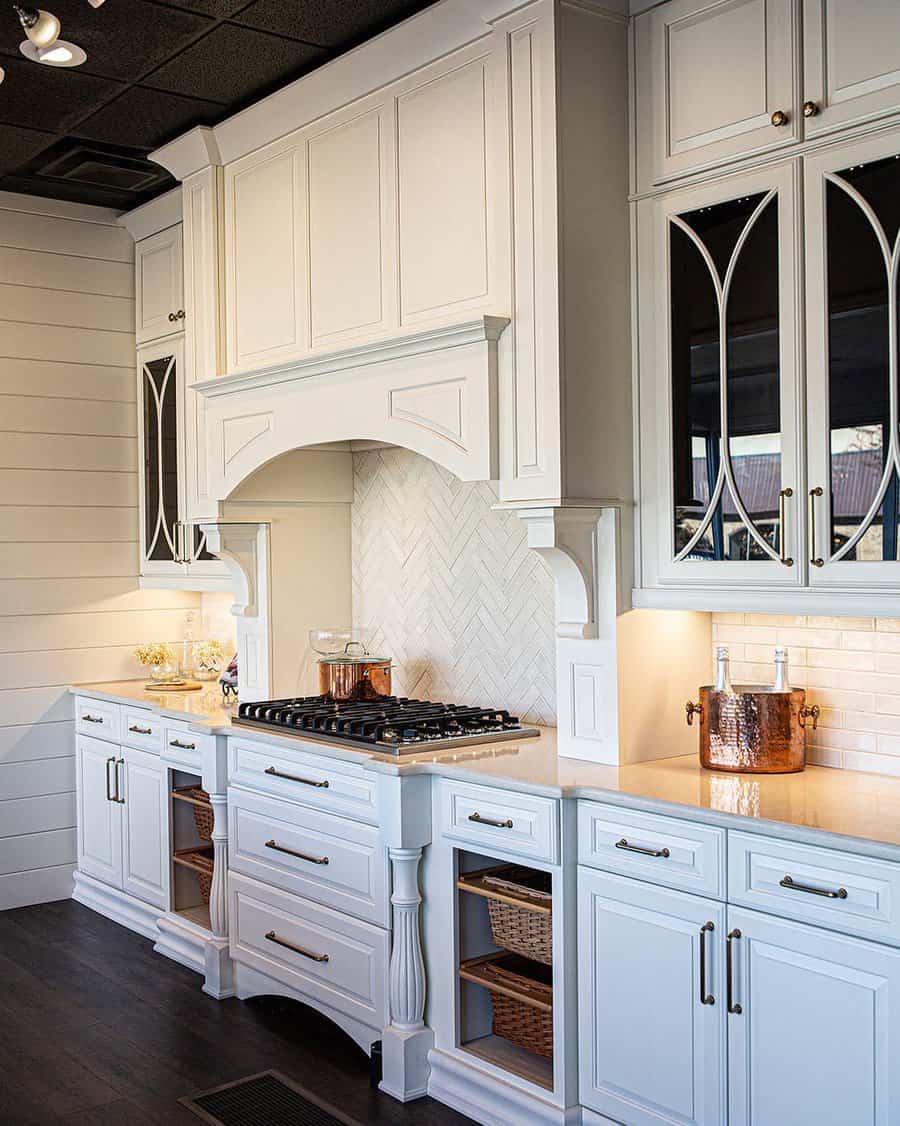 White kitchen cabinet with range hood