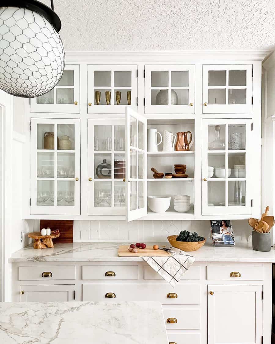 White kitchen cabinet with glass doors