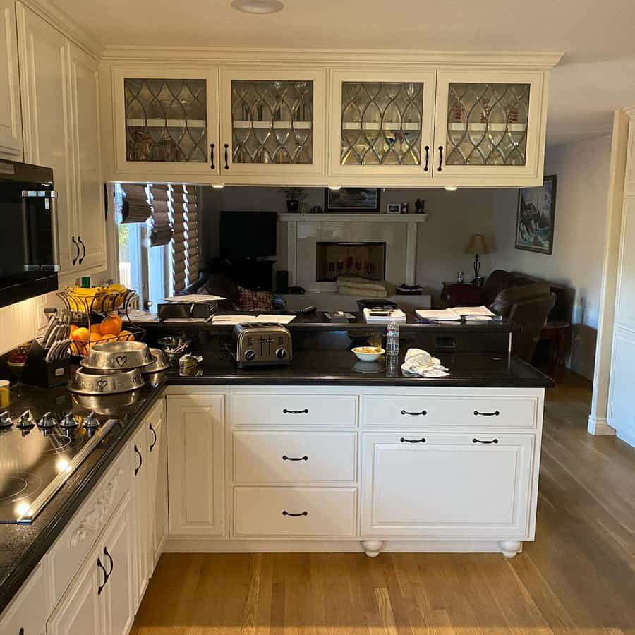 White kitchen cabinet with glass doors