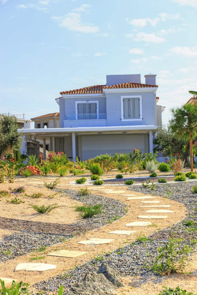 House with drought tolerant landscaping and winding path