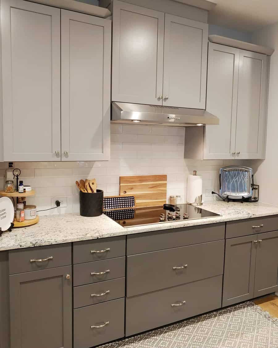 Modern kitchen with gray cabinets and white countertop