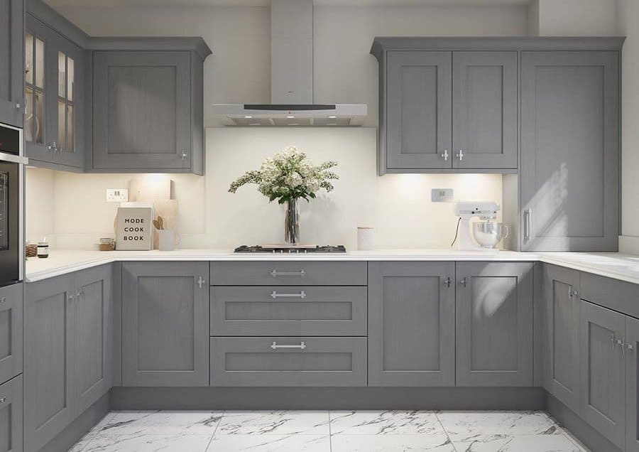 Elegant grey kitchen with marble flooring