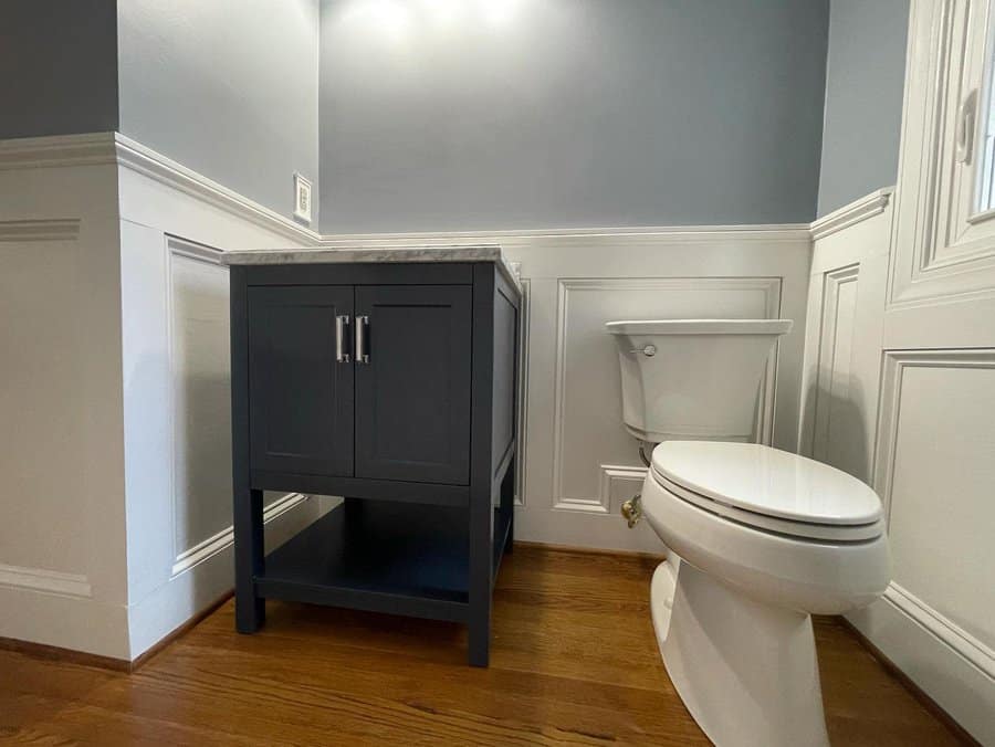 Half bathroom with standalone vanity