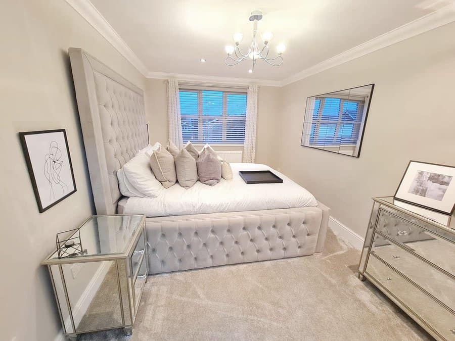 Luxurious grey bedroom with mirrored furniture