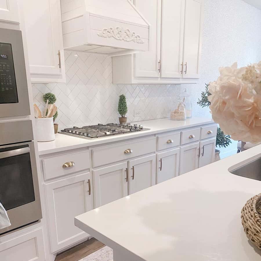 Herringbone tile kitchen backsplash