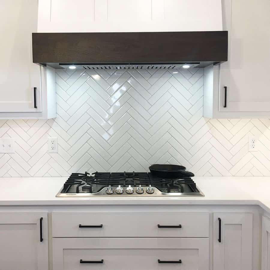 Herringbone tile kitchen backsplash