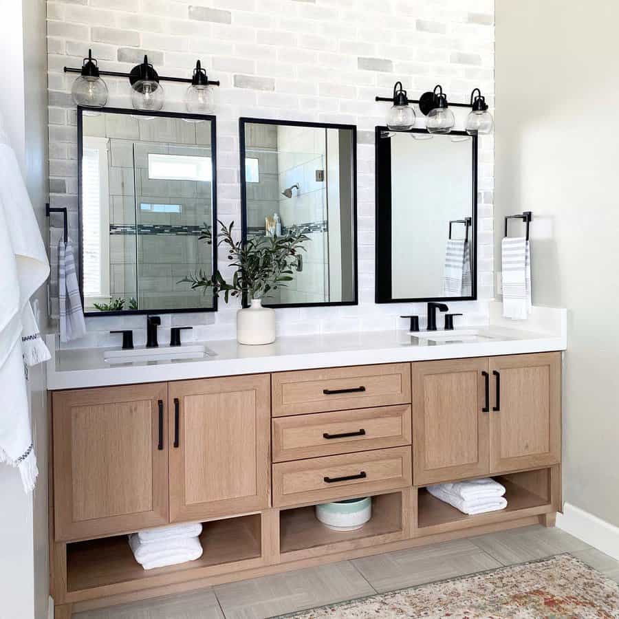 Modern vanity with twin mirrors and sconces