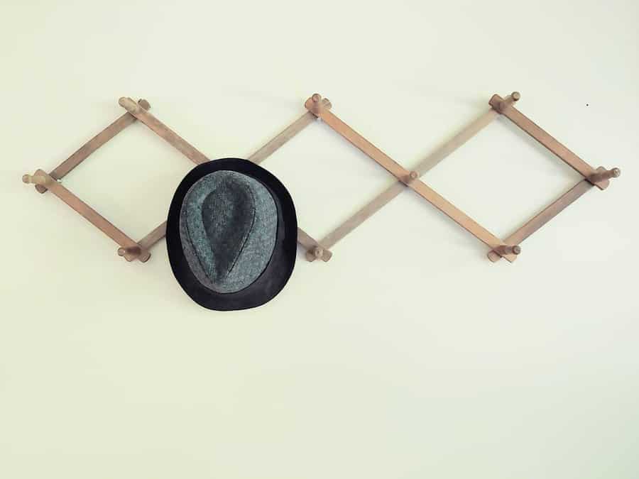 Wooden wall mounted hat rack