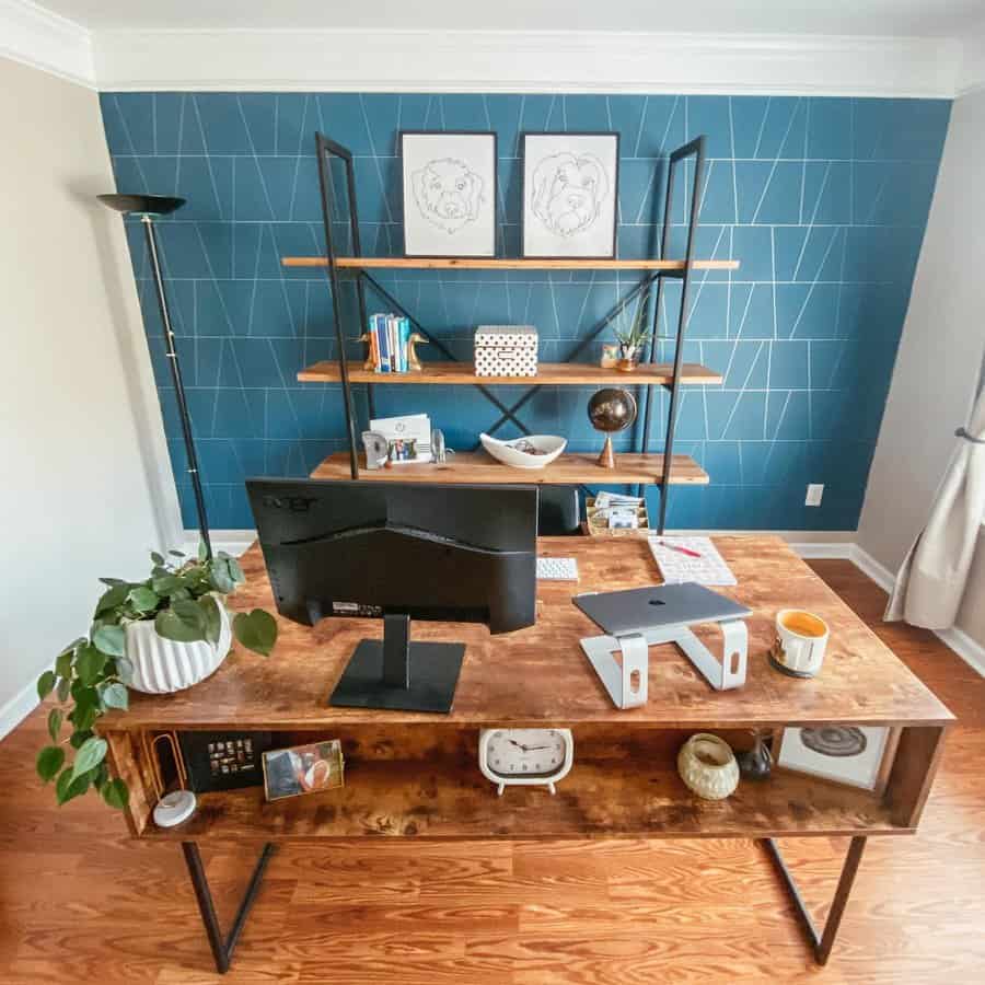 Warm industrial home office with blue tile wall and wood accents