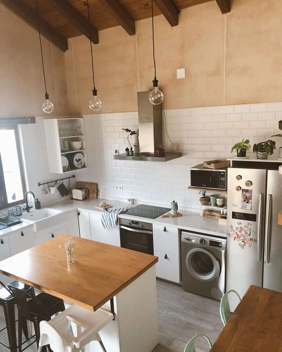 Rustic kitchen with exposed beams and pendant lights