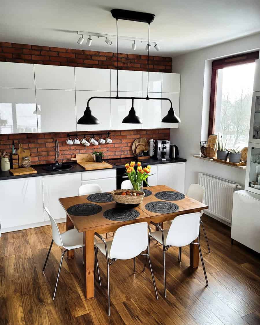 rustic kitchen with exposed brick wall