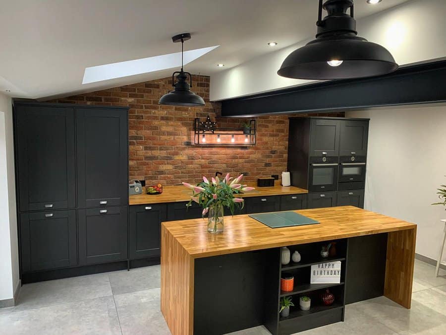 Rustic kitchen with black fixtures