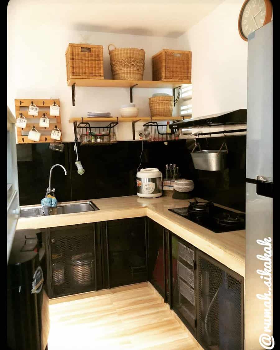 Rustic kitchen with black fixtures